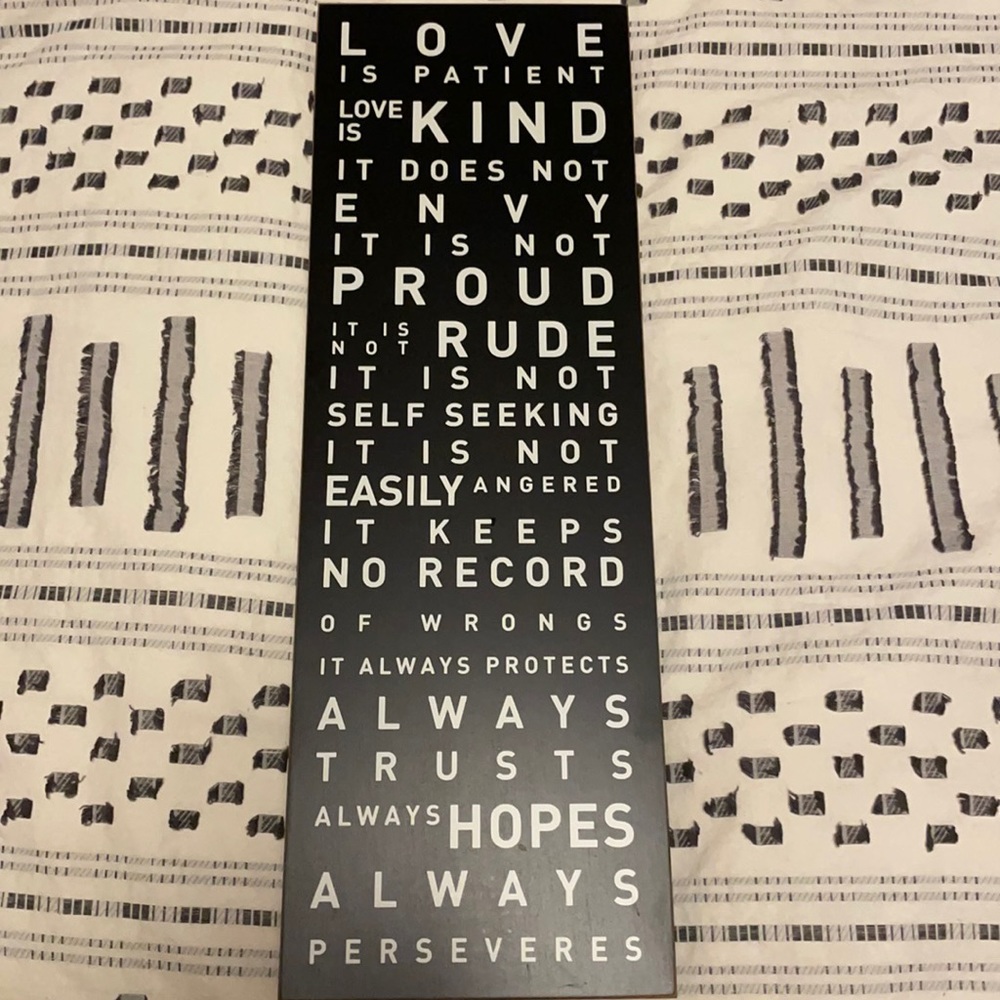Love is patient, love is kind sign